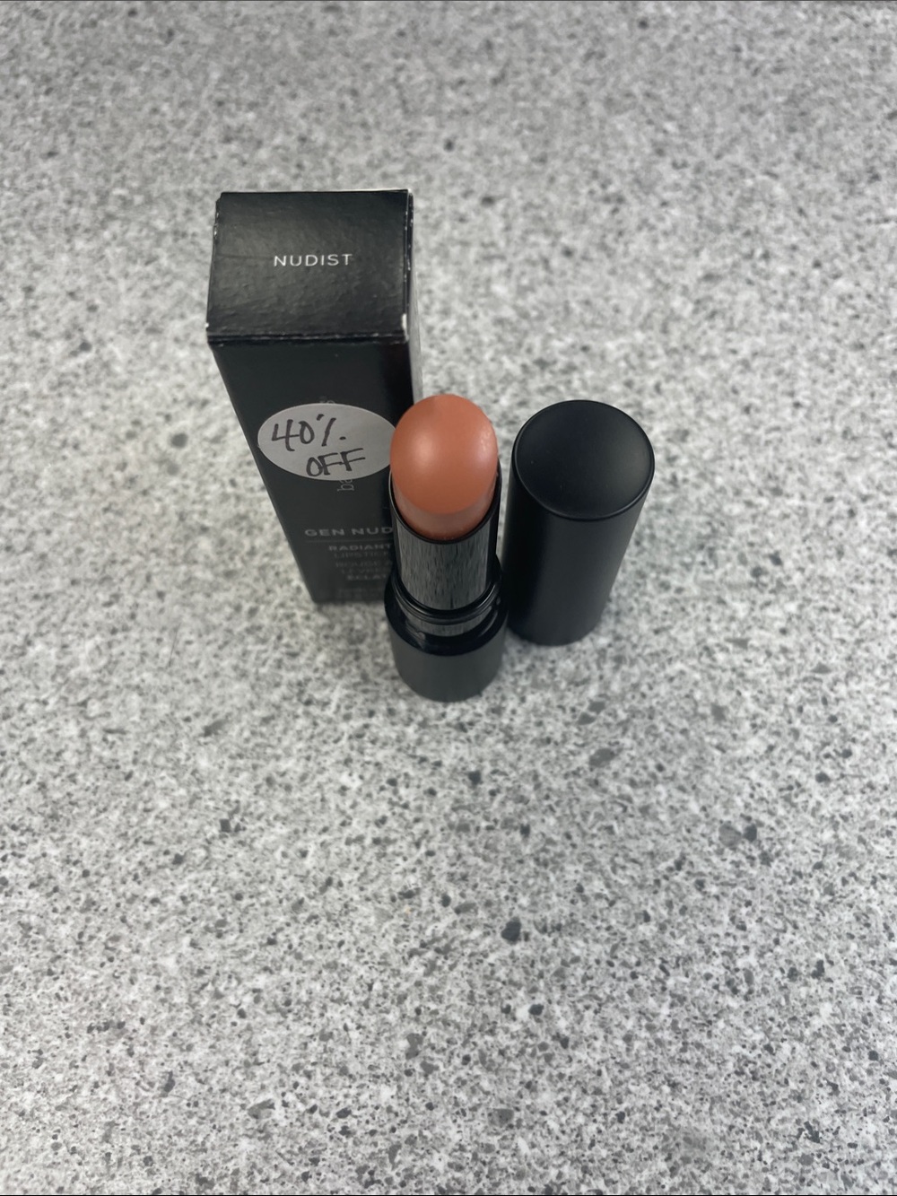 Peachy Nude Cream Lipstick - Warm Peach Shade color on box Nudist